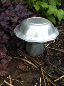 DIY glass and metal garden mushroom